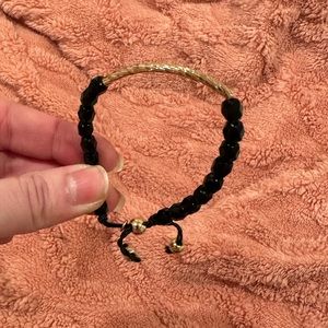 Black, leather and metal adjustable bracelet